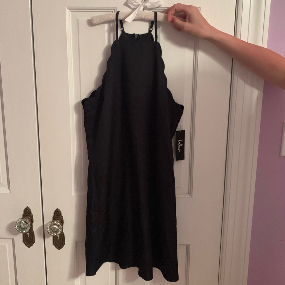 Brand new women’s black dress